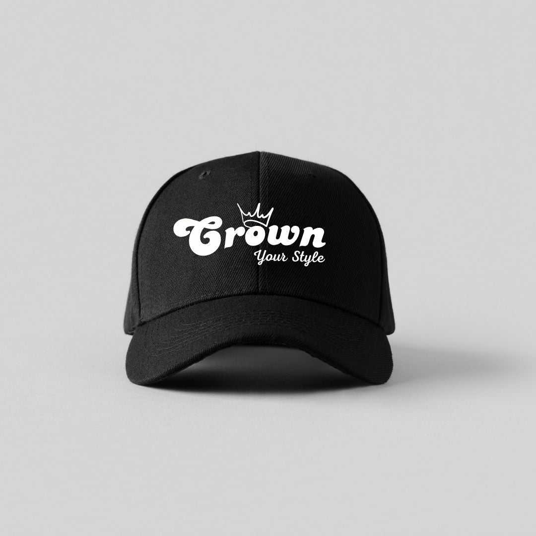 Black cap with 'Crown Your Style' text on a gray background