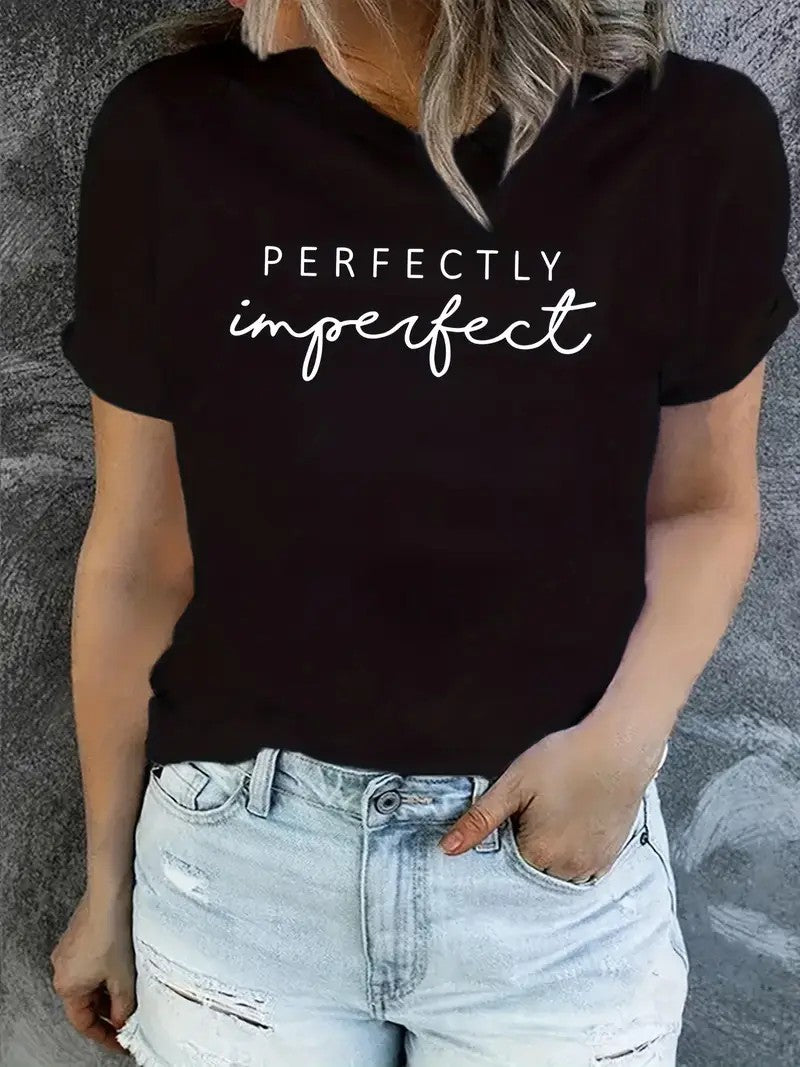 Person wearing a black t-shirt with 'Perfectly Imperfect' text on a gray background